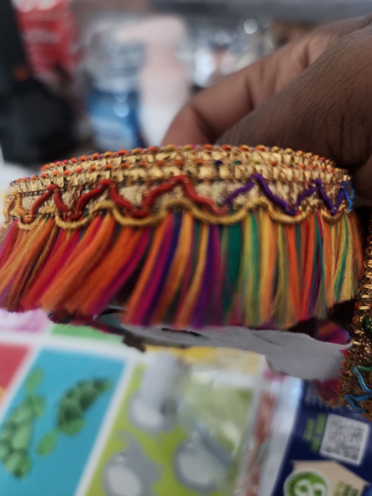 Multi color brush fringes with gold trim